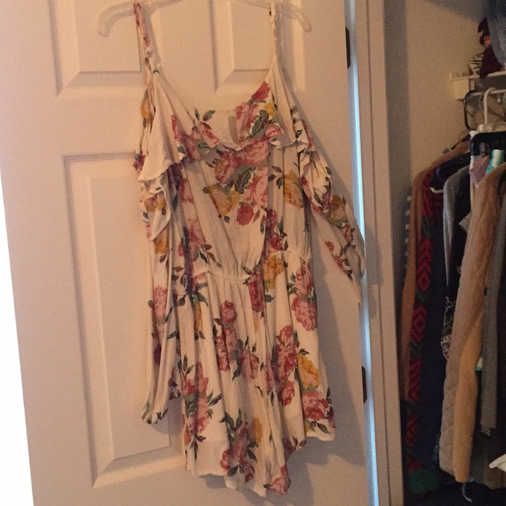 Floral white romper with ruffled cold shoulder